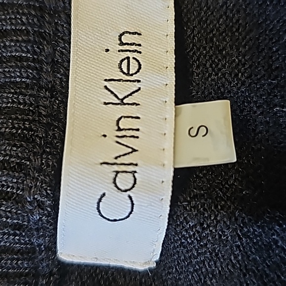 CALVIN KLEIN, NWOT. Black lightweight sweater with bling on the front Size small - Picture 8 of 10